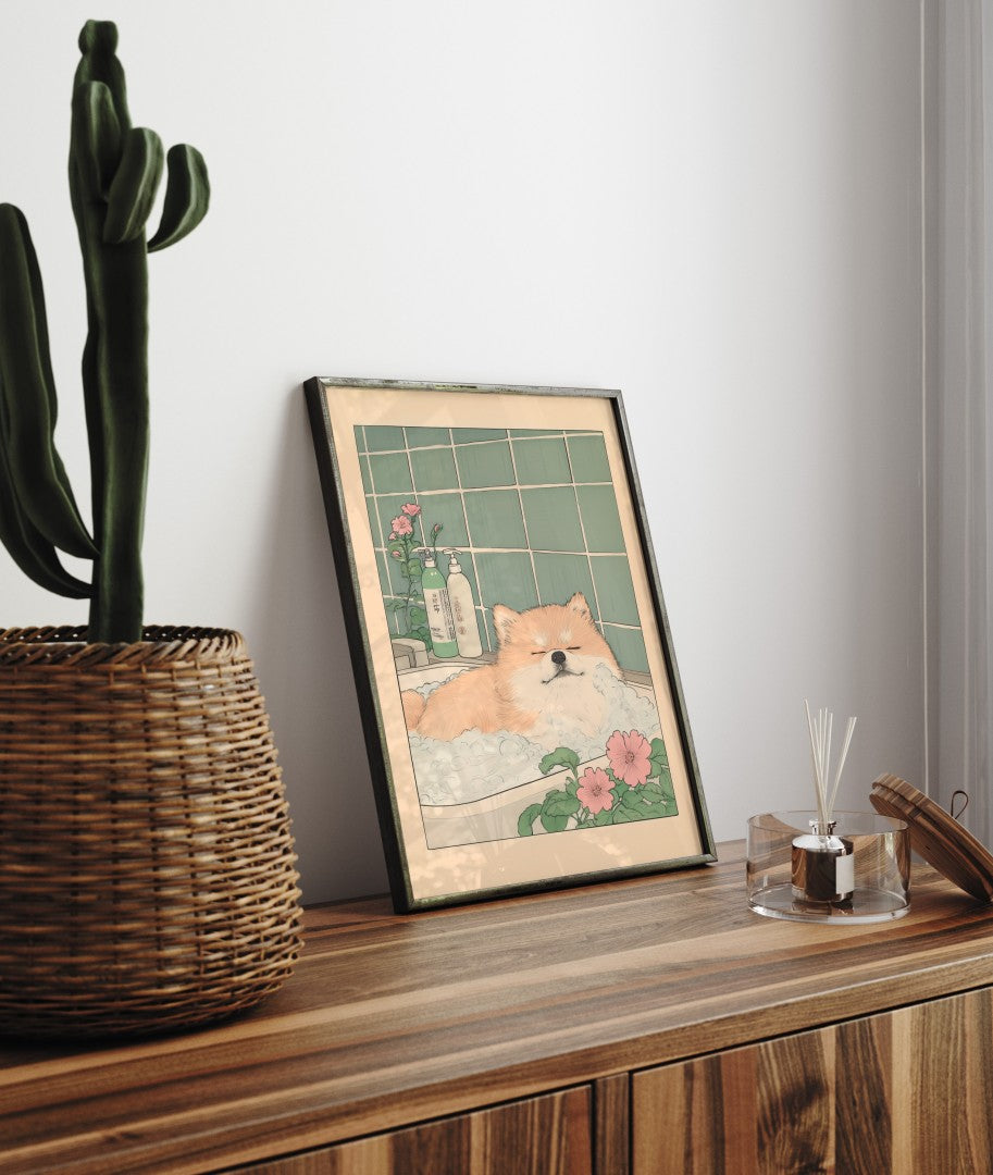 Framed Japanese-inspired artwork of a dog resting in a steamy bath with shampoo bottles