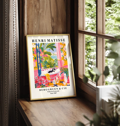 Framed wall art of a badger soaking in a tub, surrounded by tropical plants and bold florals in Matisse style.