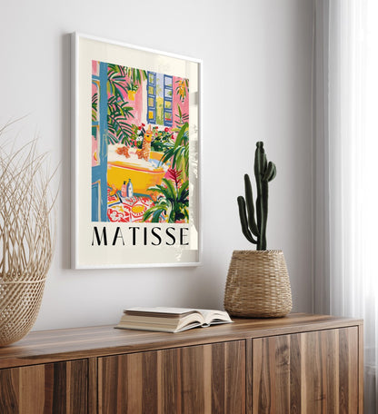 Framed colorful llama bath wall art print in Henri Matisse inspired style with lush greenery, flowers, and open windows - decorative bathroom print for wall decor
