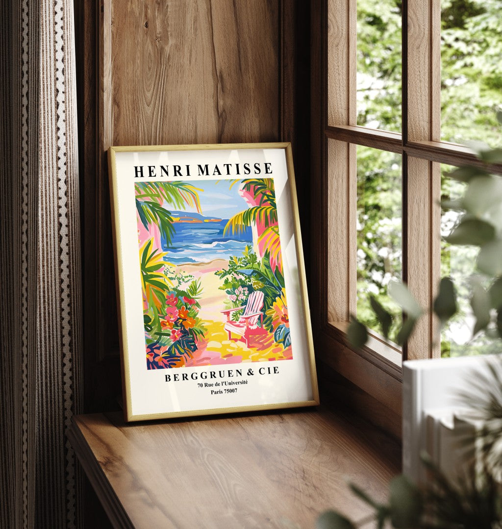 Framed art print showing pink chair by beach with tropical plants