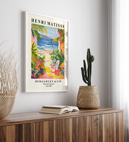 Coastal framed art print featuring chair on sandy shore with ocean view