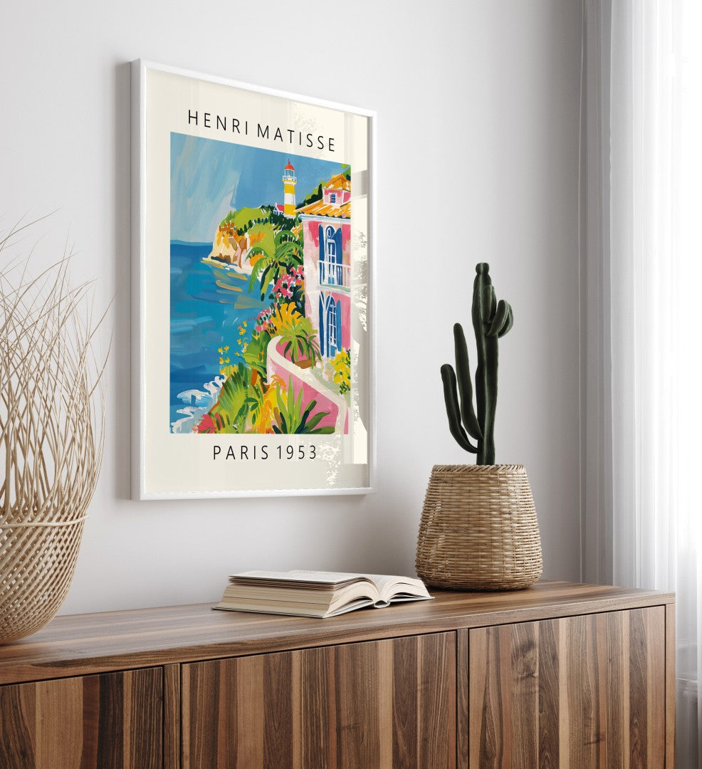 Coastal framed art print featuring villa, lighthouse, and seaside cliffs