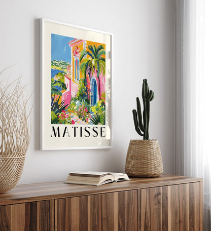 Mediterranean framed art print featuring pink villa, palm tree, and sea view