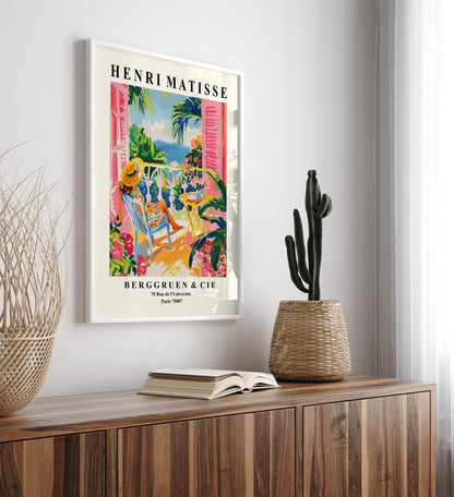 Seaside framed art print featuring pink shutters, tropical plants, and terrace scene