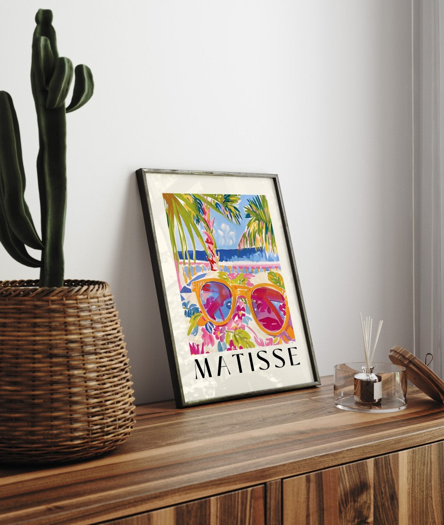 Framed tropical art print with sunglasses, palm trees, and ocean in Matisse inspired colors