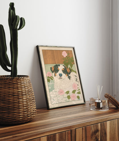 Framed bathroom art of a relaxed Aussie pup enjoying a bath with blossoms and soft tiles