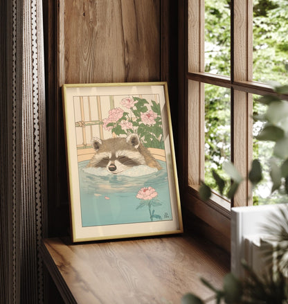 Framed bathroom art print featuring a calm raccoon soaking in a Japanese tub surrounded by peonies